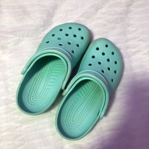 Teal Crocs